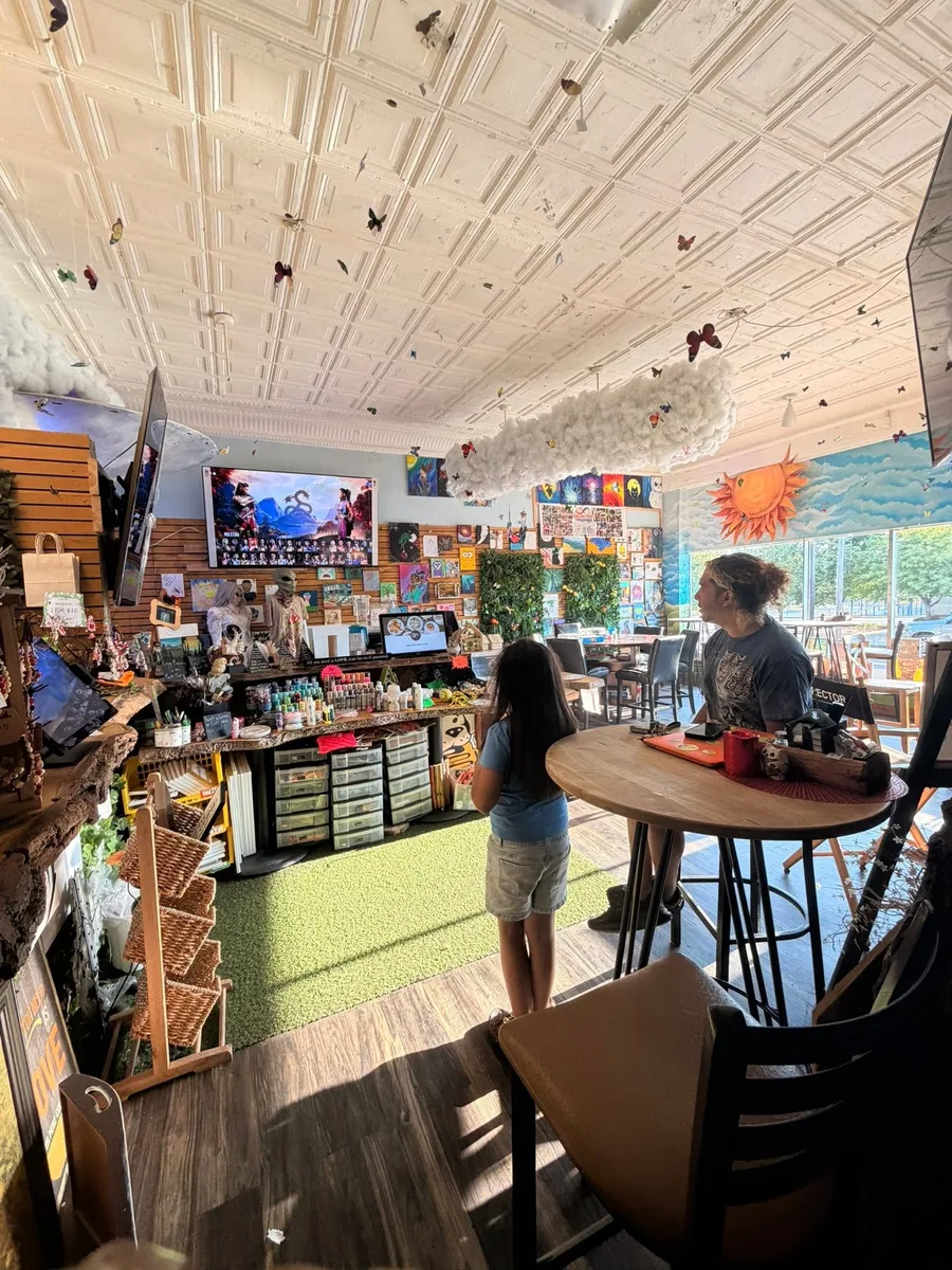 The colorful, art-filled interior of A Walk in the Park Cafe